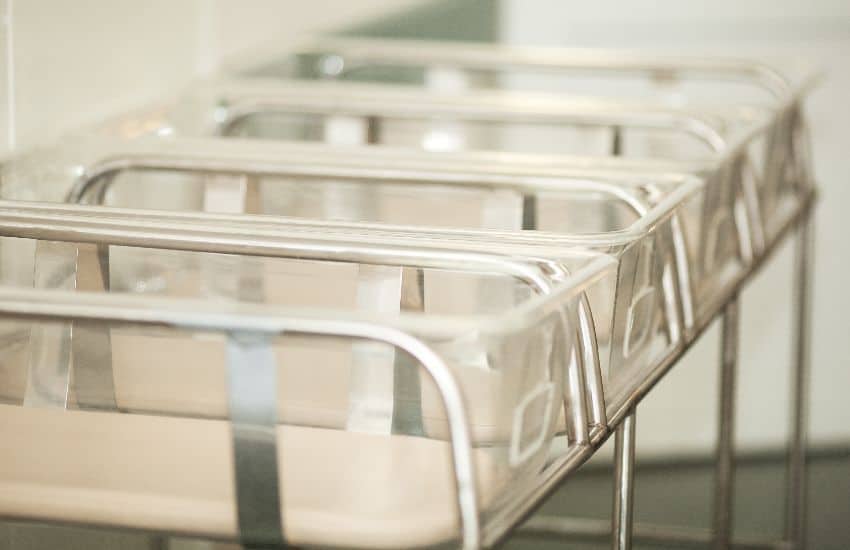 Birthing Center Room With Hospital Bassinets At Gumbo Medical, Providing Safe And Supportive Childbirth Care.