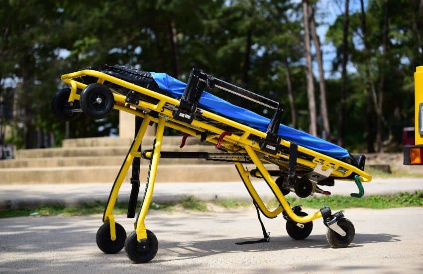 Stryker Stretcher Sitting Outside Of An Ambulance