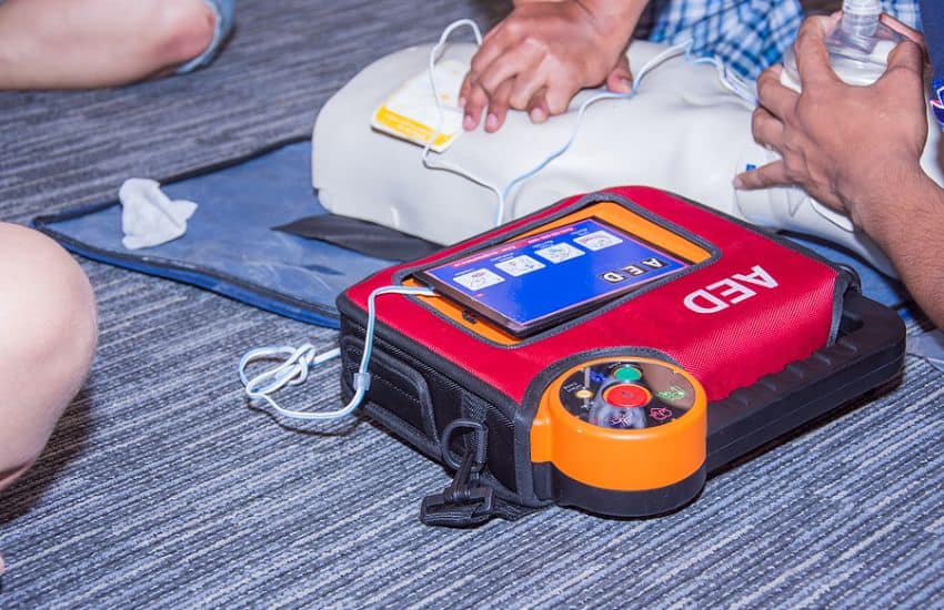 How To Inspect A Used Aed Before You Buy 2 Someone Testing A Aed.