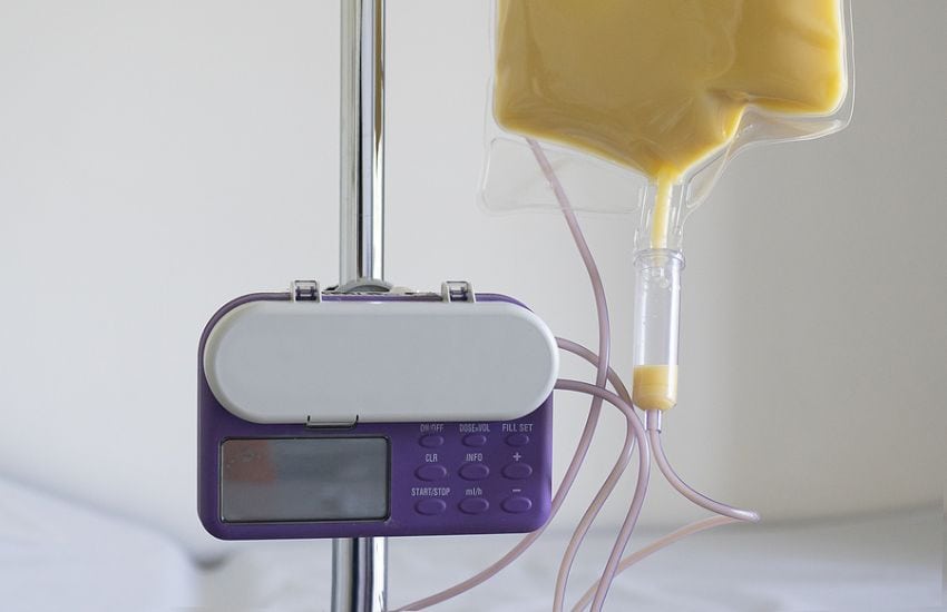 Using Refurbished Pumps For Iv Antibiotic Delivery 2 An Iv Infusion Pump Connected To A Yellow Fluid Bag, Used For Delivering Medication To Patients.&Quot; Let Me Know If You'D Like To Mention That It'S For Antibiotics Or Hospital Use